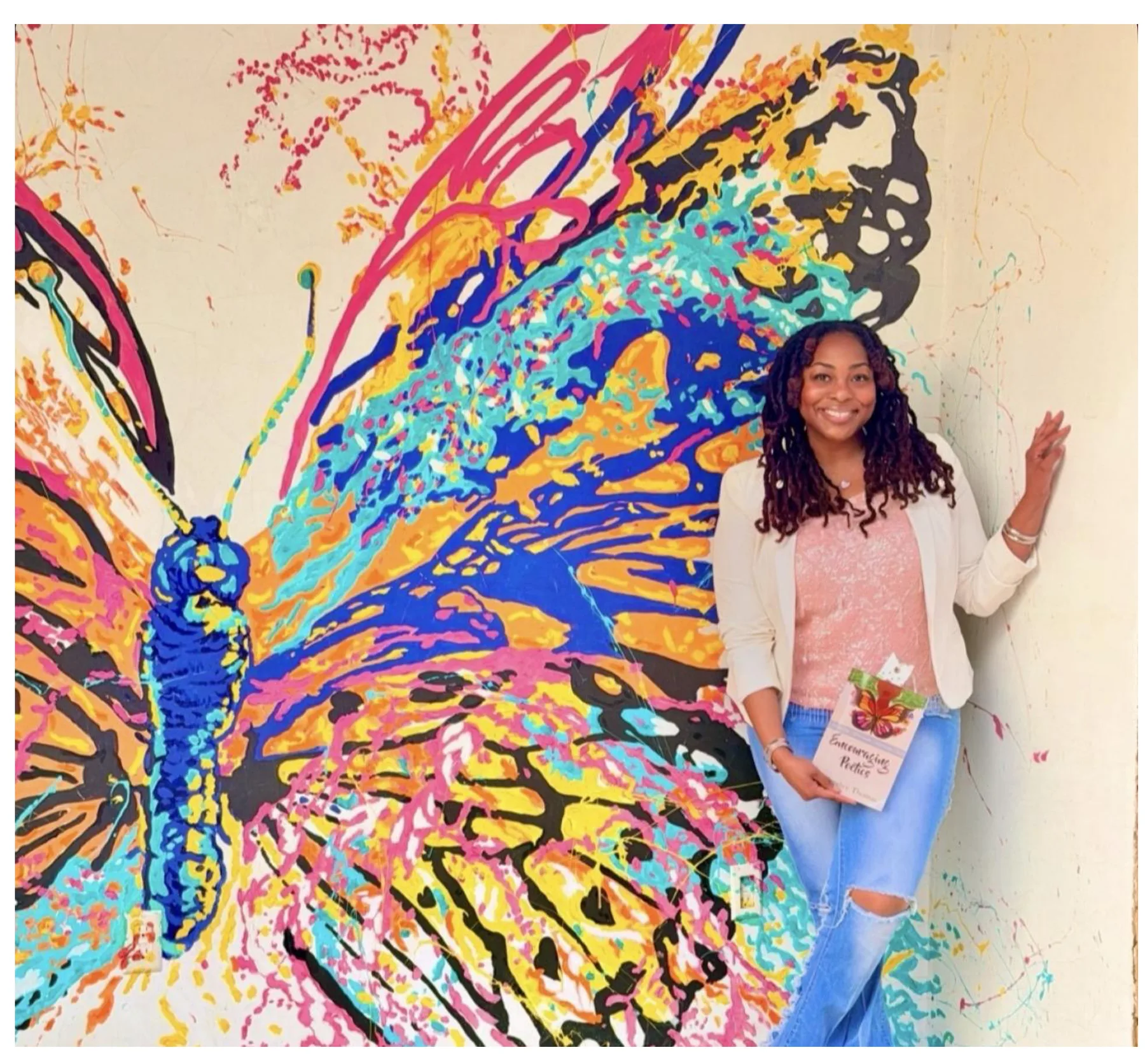 Kalandice at butterfly mural